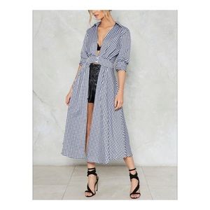 Woman’s black and white gingham blouse